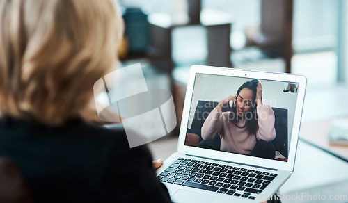 Image of Video call, laptop and online therapy by therapist talking to a depressed person with telehealth for anxiety or mental health. Virtual, psychology and psychologist counseling a woman with depression