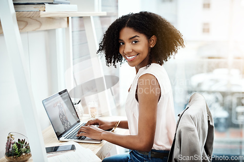 Image of Typing, computer and woman portrait in office planning, online research and fashion blog for business startup. Face of a creative, young African person with technology app, laptop and website design