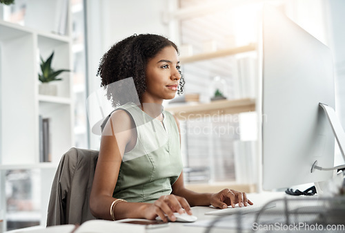 Image of Computer, search and business woman in office online management, copywriting or editing on website software. Young african person reading, research or working on desktop, keyboard and report analysis