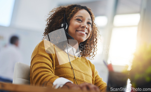 Image of African woman, call center agent or smile with voip for consulting, listening or contact us in office. Female consultant, customer service or tech support crm with headphones, microphone or help desk