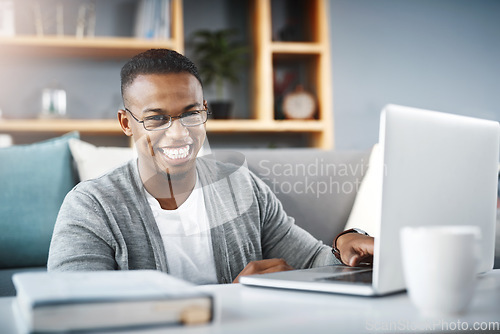 Image of Laptop, home and portrait of man or student with e learning, university online course or college studying in living room. Happy, excited and young african person on computer for scholarship research