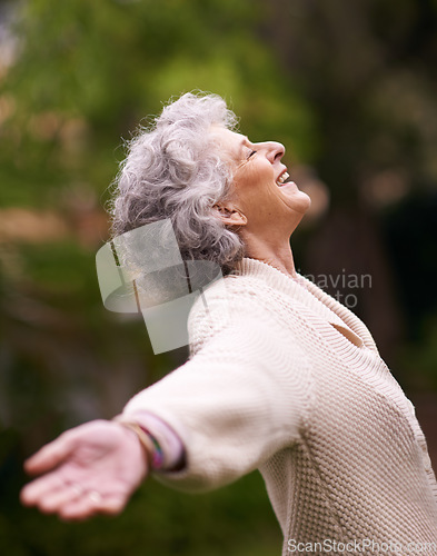 Image of Happiness, senior woman with open arms enjoying life outdoors or success, happy and retired lady celebration of financial freedom. Healthy, smiling pensioner stretching with joy in retirement