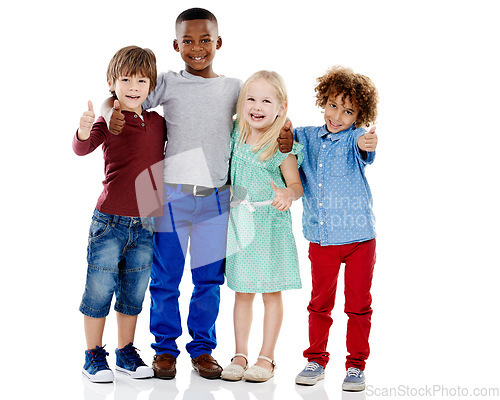 Image of Kids, group and thumbs up for diversity in studio portrait with smile, hug or care by white background. Girl, boy or isolated friends for happiness, hand sign or solidarity for children with kindness