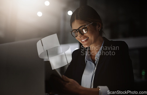 Image of Night, office and happy woman with digital tablet for research, solution and idea inspiration. Online, search and female office worker working late on proposal, goal and task at startup business
