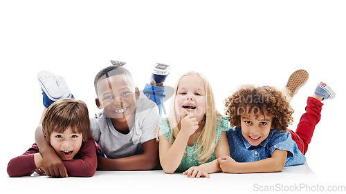 Image of Diversity, children and happy friends or fun on the floor together or against a white background and hug. Smile, kids and playful or laughing and isolated in studio or excited buddies and embrace