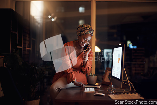 Image of Business, black woman and phone call on smartphone, computer typing and conversation at night. Happy worker, cellphone and communication for desktop management, mobile network and overtime in office