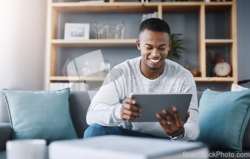 Image of Smile, tablet and man on sofa on social media meme, email or streaming video on subscription service. Happiness, internet and networking, happy male surfing online and movie website on couch in home.