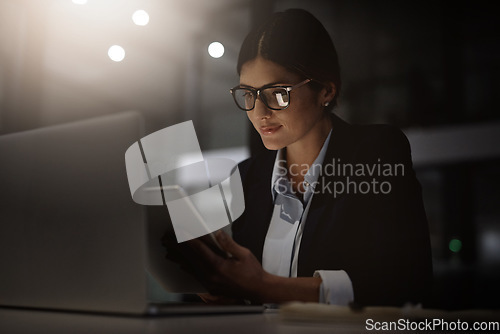 Image of Office, night and business woman with digital tablet for research, solution and idea. Online, search and focused lady office worker working late on proposal, goal and task at startup company