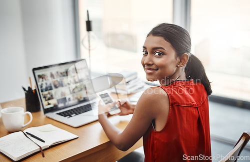 Image of Technology, portrait of happy businesswoman with smartphone and laptop at desk in office. Social media or communication, browsing and smile with female worker on cellphone reading or writing