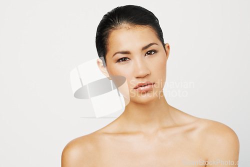 Image of Natural beauty, Asian woman and portrait with skincare and dermatology with mockup. Isolated, white background and young female person with face makeup and skin glow from cosmetics and treatment