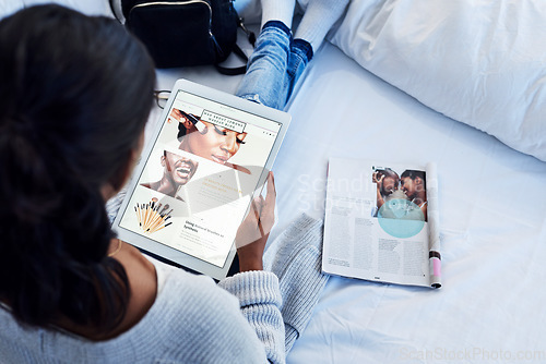 Image of Makeup, tablet and woman influencer reading social media, online or internet blog about beauty in her bedroom. App, website and young person learning cosmetics from the web and research a magazine