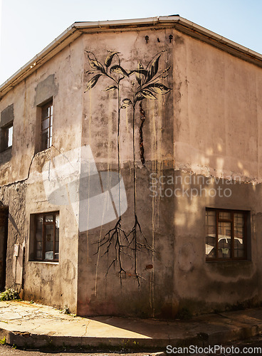 Image of Graffiti tag, street art and city wall in Cape Town with painting and artwork showing creativity. Angel illustration, building mural and creative paint graphic on urban road in Africa with design