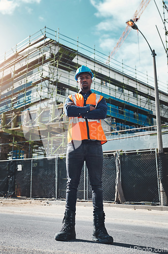 Image of Construction, engineer man and portrait at building project for development and architecture. Black male contractor serious about project management, engineering and inspection outdoor in city