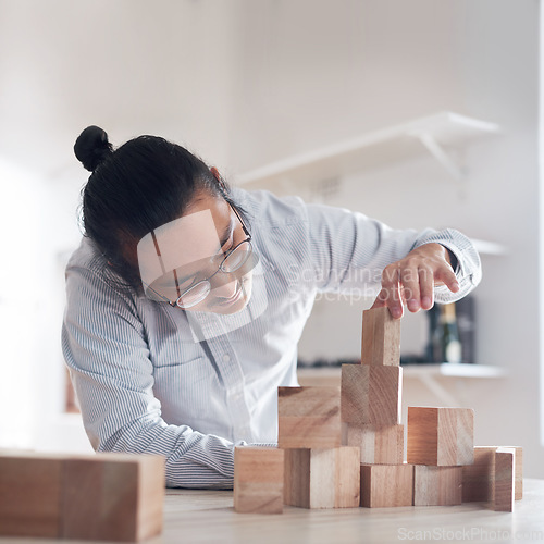 Image of Man, office and building block game, thinking challenge and design innovation for balance and construction. Engineering, architecture and Japanese designer with wood blocks for problem solving games.