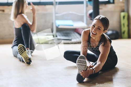 Image of Portrait, stretching and women training, balance and workout for stress relief, wellness and healthy lifestyle. Face, female people and athletes on the floor, stretch legs and practice with progress