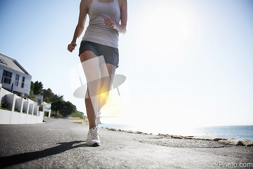 Image of Woman, running and knee x ray for injury, workout or sport accident during exercise or run in the city. Female runner in body fitness with sore leg, ache or bone from exercising or training on road