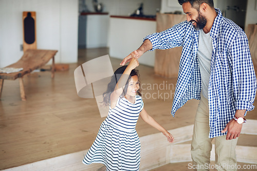 Image of Family, father and girl dance, home and happiness with love, bonding and movement in the lounge. Male parent, female child and daughter with dad, kid and dancing for fun, playful and loving together