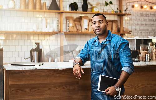 Image of Business owner, tablet and portrait of man in cafe for online, entrepreneurship or barista startup. Network, technology or food industry for African waiter in restaurant for internet and coffee shop