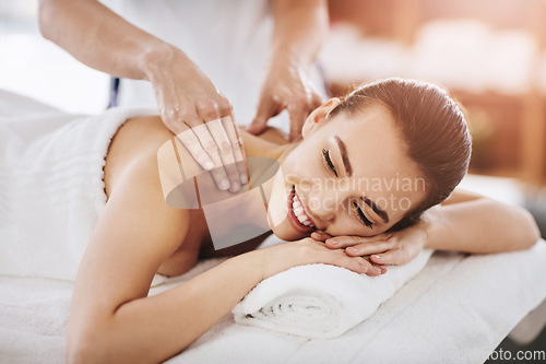 Image of Relax, smile and massage with woman in spa for wellness, luxury and cosmetics treatment. Skincare, peace and zen with female customer and hands of therapist for physical therapy, salon and detox