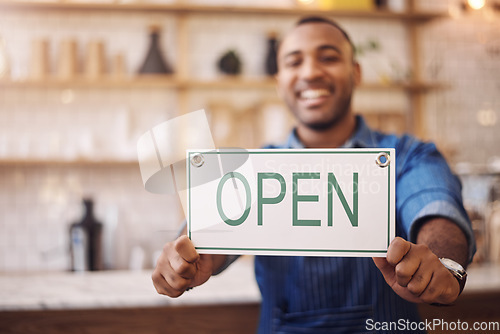 Image of Closeup of open sign, man and owner of shop, store and advertising notice of retail trading time, services and information. Hands of happy cafe worker with opening banner, welcome and startup poster