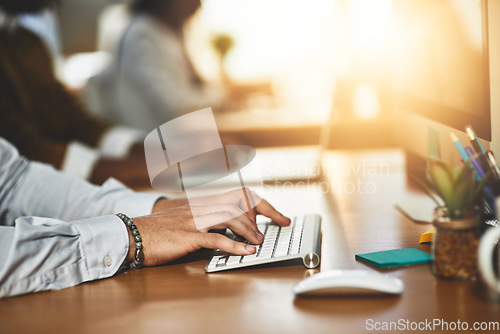 Image of Hands, office or man typing on computer working on business project or online research at desk. Person, closeup or male worker copywriting on startup blog report or internet article with keyboard