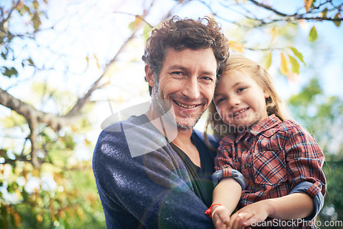 Image of Happy, smile and portrait of father and daughter in backyard garden for hugging, bonding or affectionate. Happiness, relax and excited with man and young girl in outdoors for embrace, autumn and care