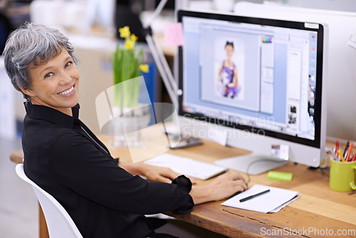 Image of Senior woman at desk, computer screen and smile in portrait, editor at magazine and editing image with software for publication. Professional female with creativity and editorial career with design