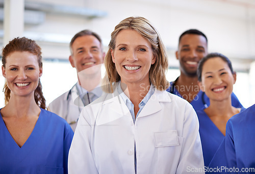 Image of Healthcare, portrait of medical team smiling and in hospital building. Teamwork or collaboration, happy medicine staff together and group of woman doctors or nurses in clinic or workplace.