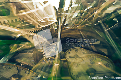 Image of Machinery, closeup and inside a clock with parts for creative, design and time piece in a workshop. Abstract, zoom and vintage objects or parts of a watch, mechanics and metallic detail in production