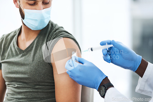 Image of Covid, vaccine and man doctor with cotton in healthcare consultation for safety or prevention. Corona, vaccination and arm injection for guy person by physician in gloves for hospital compliance