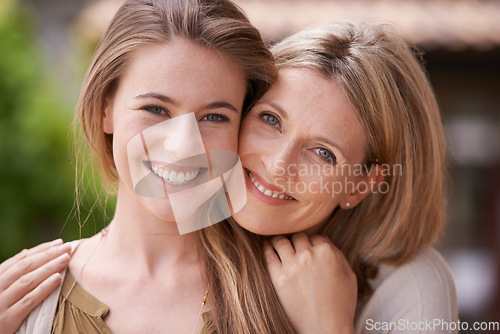 Image of Smile, hug and portrait of a mother and daughter with happiness, love and care in a garden. Parents, family and a mature mom hugging a happy woman for affection, content and together in a backyard