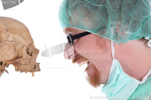 Image of surgeon with skull