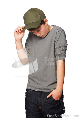 Image of Fashion, cool and a shy teenager with a cap isolated on a white background in a studio. Serious, thinking and a young boy looking awkward, introverted and with shame while stylish in clothes
