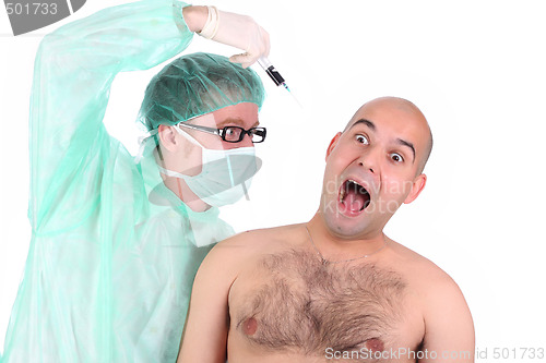 Image of surgeon injecting a scare patient 