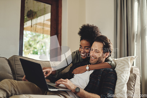 Image of Laptop, relax and diversity with a couple watching a movie using an online subscription service for entertainment. Computer, streaming or internet with a man and woman bonding together over a video