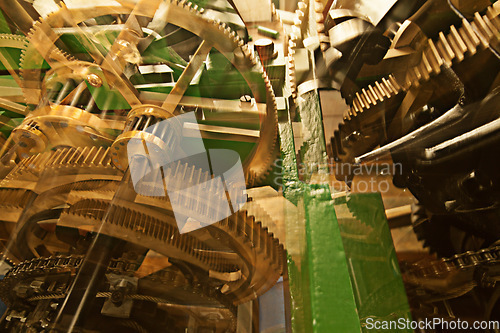 Image of Clock, gears and machine wheel interior with brass mechanics and engine. Gear cog, wheels and golden time mechanism with machinery and cogs for speed, transport and mechanical work of vehicle