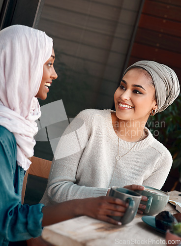 Image of Friends, coffee and happy with Muslim women in cafe for conversation, food and social. Smile, relax and culture with arabic female customer in restaurant for discussion, happiness and meeting