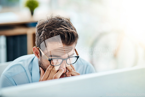 Image of Business man, headache and pain, tired or fatigue in office while working on pc. Burnout, migraine and male person with depression, vertigo or brain fog, anxiety or mental health, stress or problem.