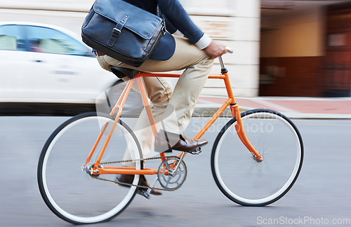 Image of Travel, bicycle and legs of business man in a road riding to work or appointment in a street. Carbon footprint, cycling and shoes of male on bike traveling in a city on eco friendly transportation