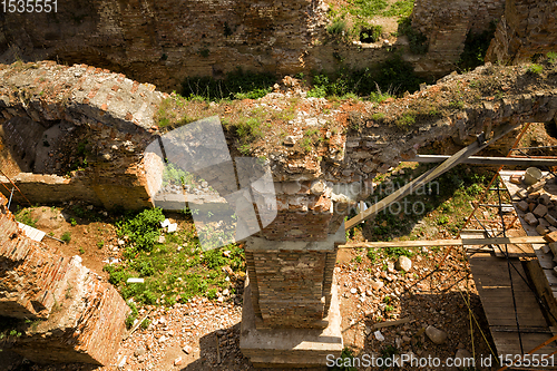 Image of crumbling old brick tower