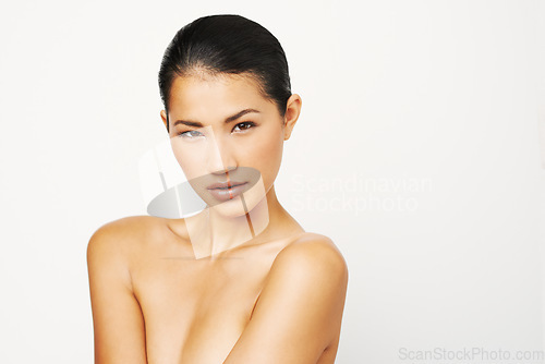 Image of Natural beauty, woman and portrait with skincare and dermatology with mockup. Isolated, white background and young Asian female person with face makeup and skin glow from cosmetics and treatment