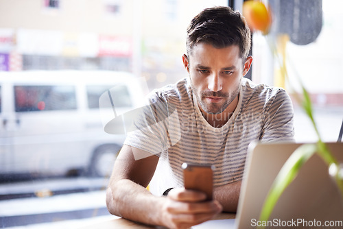 Image of Phone, laptop or man in cafe reading news on social media for an update on the stock market for trading. Coffee shop, entrepreneur or trader texting on mobile app or networking on internet or website