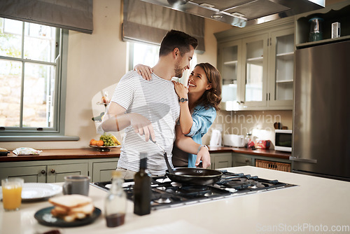 Image of Love, food and cooking with couple in kitchen and hugging for breakfast, morning and happiness. Smile, care and nutrition with man and woman eating at home for happy, health and hungry together
