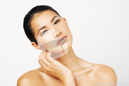 Image of Natural beauty, woman and makeup portrait with skincare and dermatology with mockup. Isolated, white background and young Asian female person with face and skin glow from cosmetics and treatment