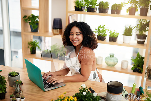 Image of Laptop, portrait and plant with woman in small business for planning, networking and website. Entrepreneurship, startup and technology with African female botanist for nature, green and garden shop