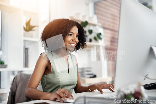 Image of Business, computer and happy woman in office for research, planning and satisfied with web search. Online, review and African female person smile for report, proposal or creative design inspiration
