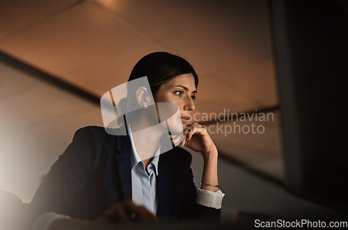 Image of Problem solving, overtime and thinking, woman in modern office reading email or online report at start up agency. Corporate night work, challenge and focus, businesswoman at desk working late on idea