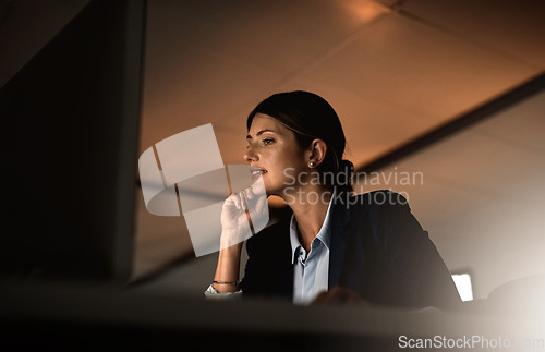 Image of Thinking, overtime and focus, woman in office reading email or online report idea at start up agency. Corporate night work, challenge and businesswoman at desk working late on computer for job ideas.