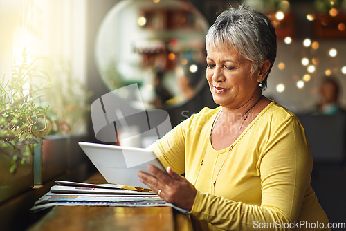 Image of Restaurant, tablet and senior woman typing, research or search internet, web or online website for cafe information. Customer experience, store feedback or elderly female client in retail coffee shop