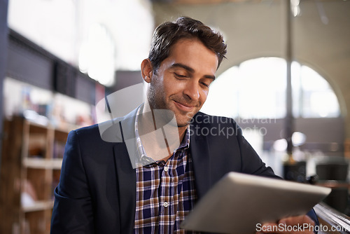 Image of Digital, happy man with tablet and in coffee shop or restaurant. Social media or communication, technology or networking for remote work and male person in cafe store or local pub on mobile device